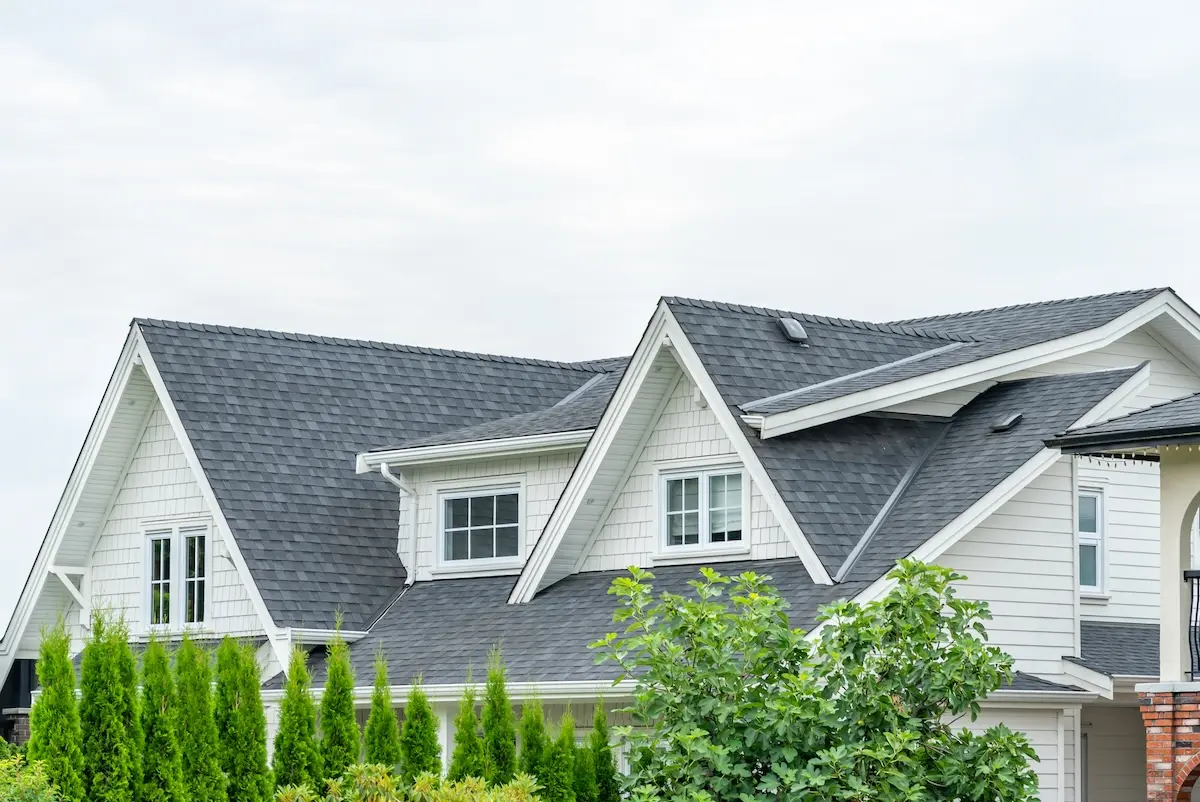 Top of luxury house with shingle roof