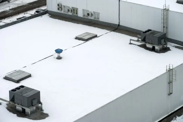 snow covered commercial roof