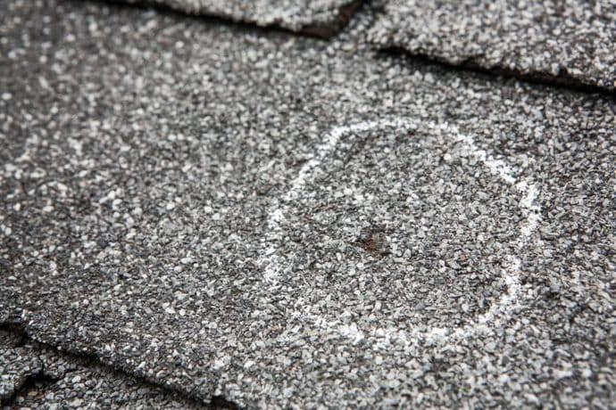 close-up damaged shingles