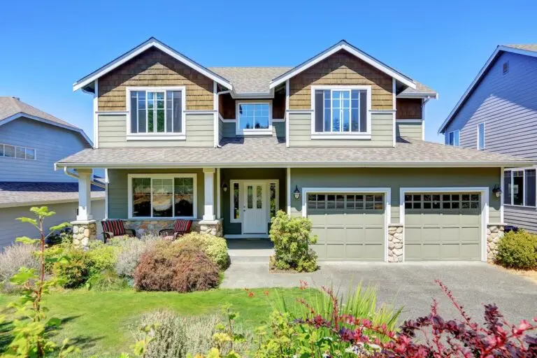 green siding on residential house