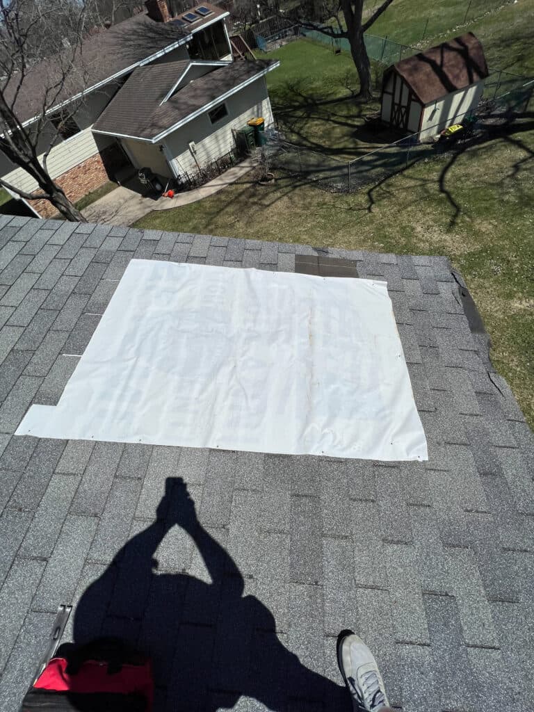 Roof with tarp and shadow