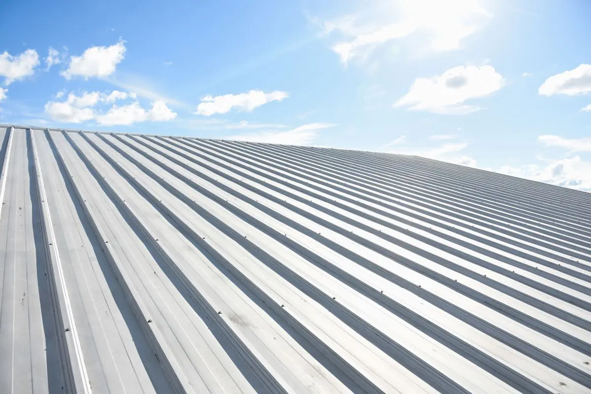 metal sheet roofing on commercial construction with blue sky