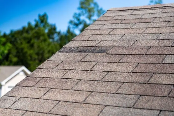 Roof damage after storm.