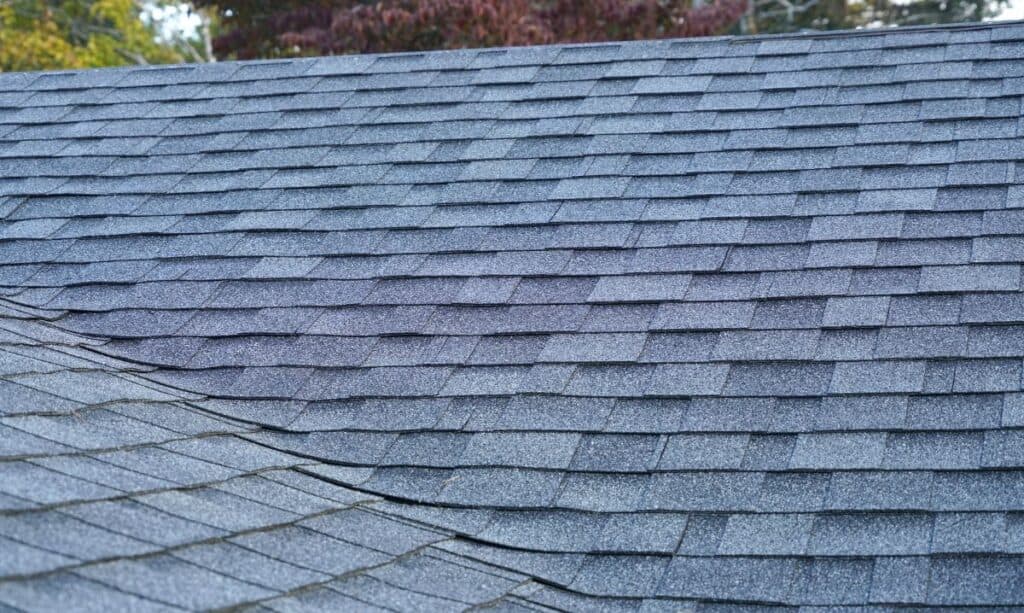 close up on new installed roof shingle