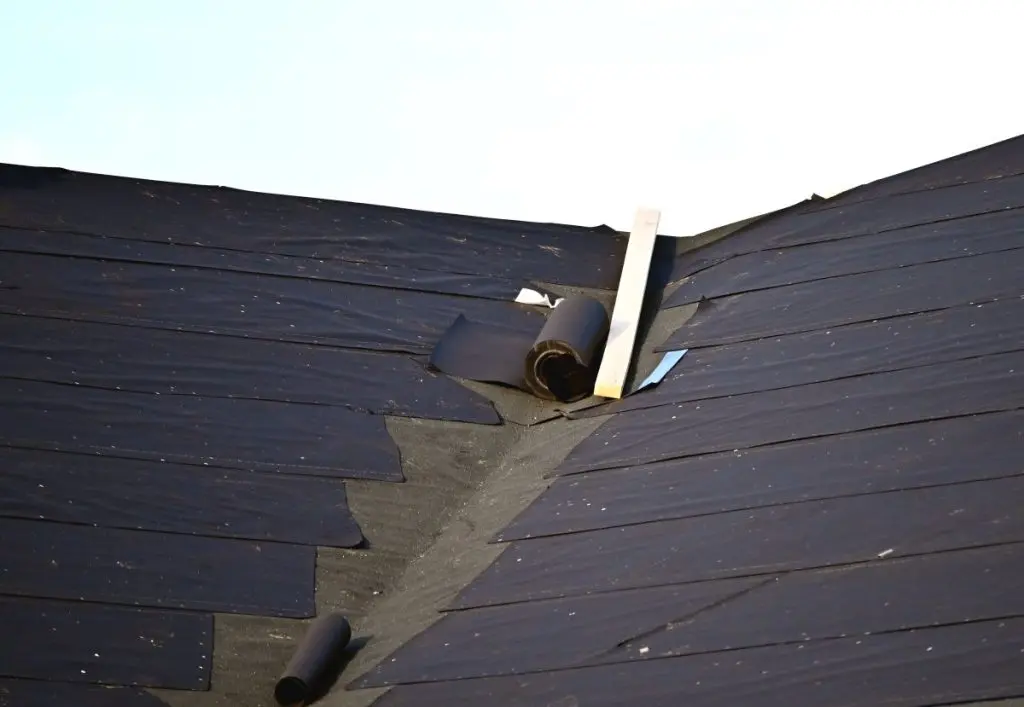 roof underlayment being installed