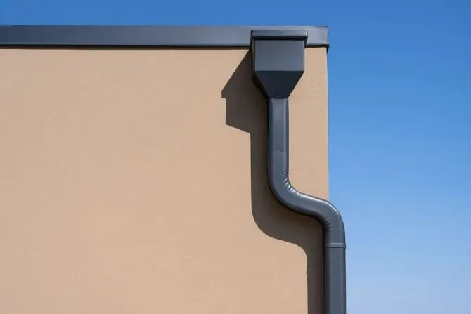 scupper and downspout on modern building