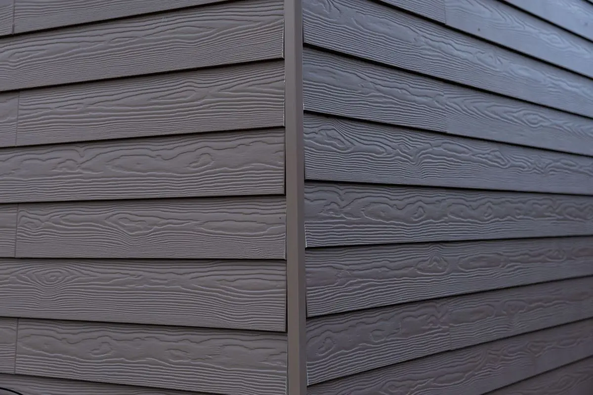 gray horizontal siding with a wood grain texture