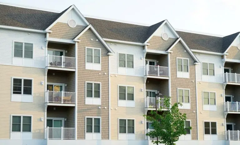 new apartment buildings with shingle roofs