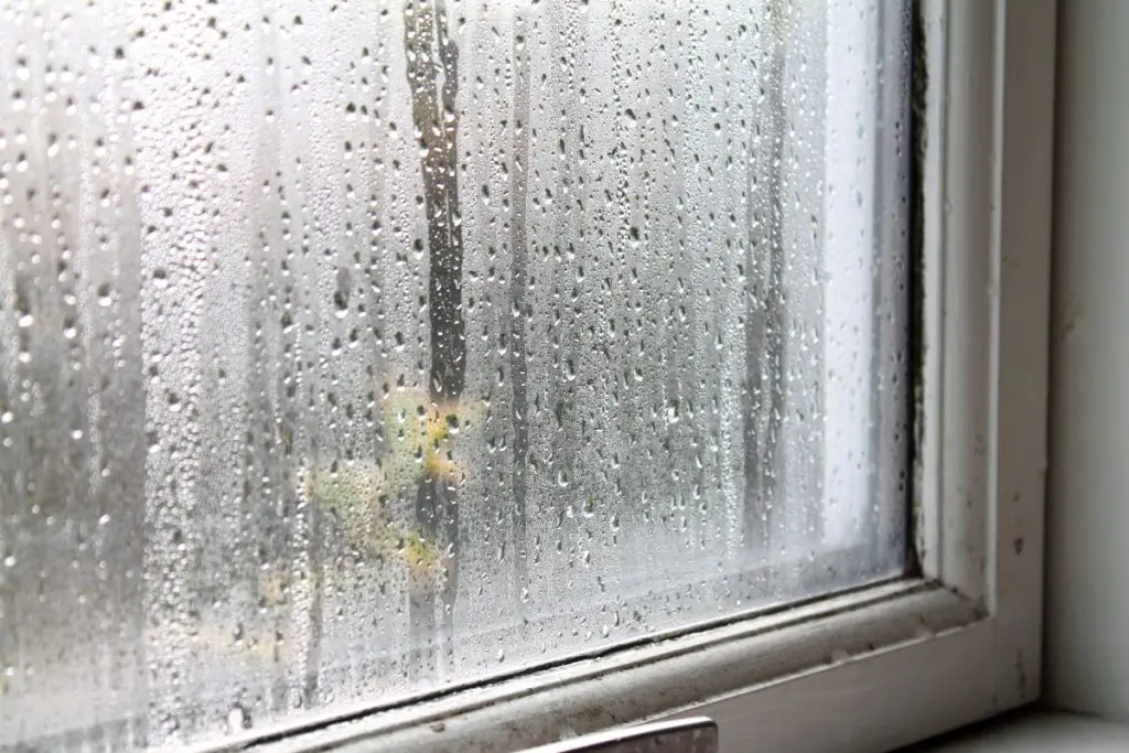 Condensation water on window glass on the inside of the house