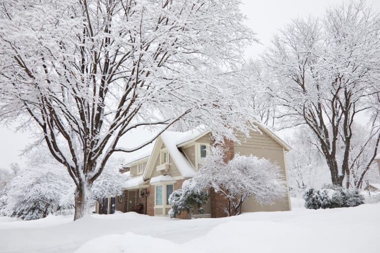 My house in a huge snowstorm during the winter Minneapolis
