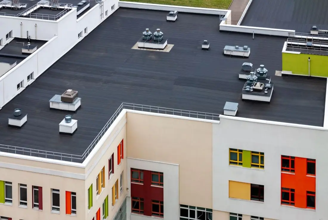 apartment complex with black roof