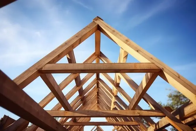Wood roof trusses constructed with construction framing beams timber