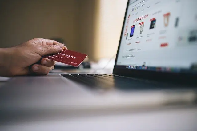 Credit card next to a computer screen