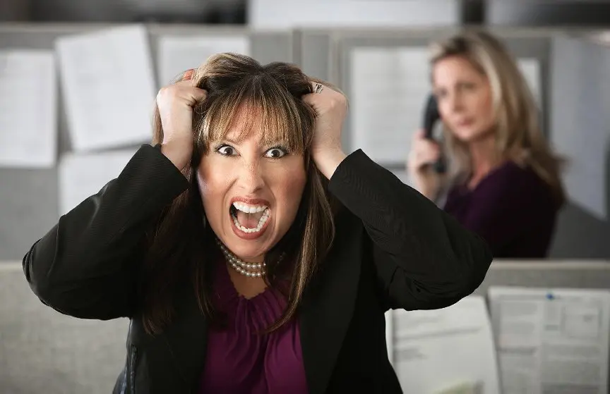 Upset woman pulling her hair