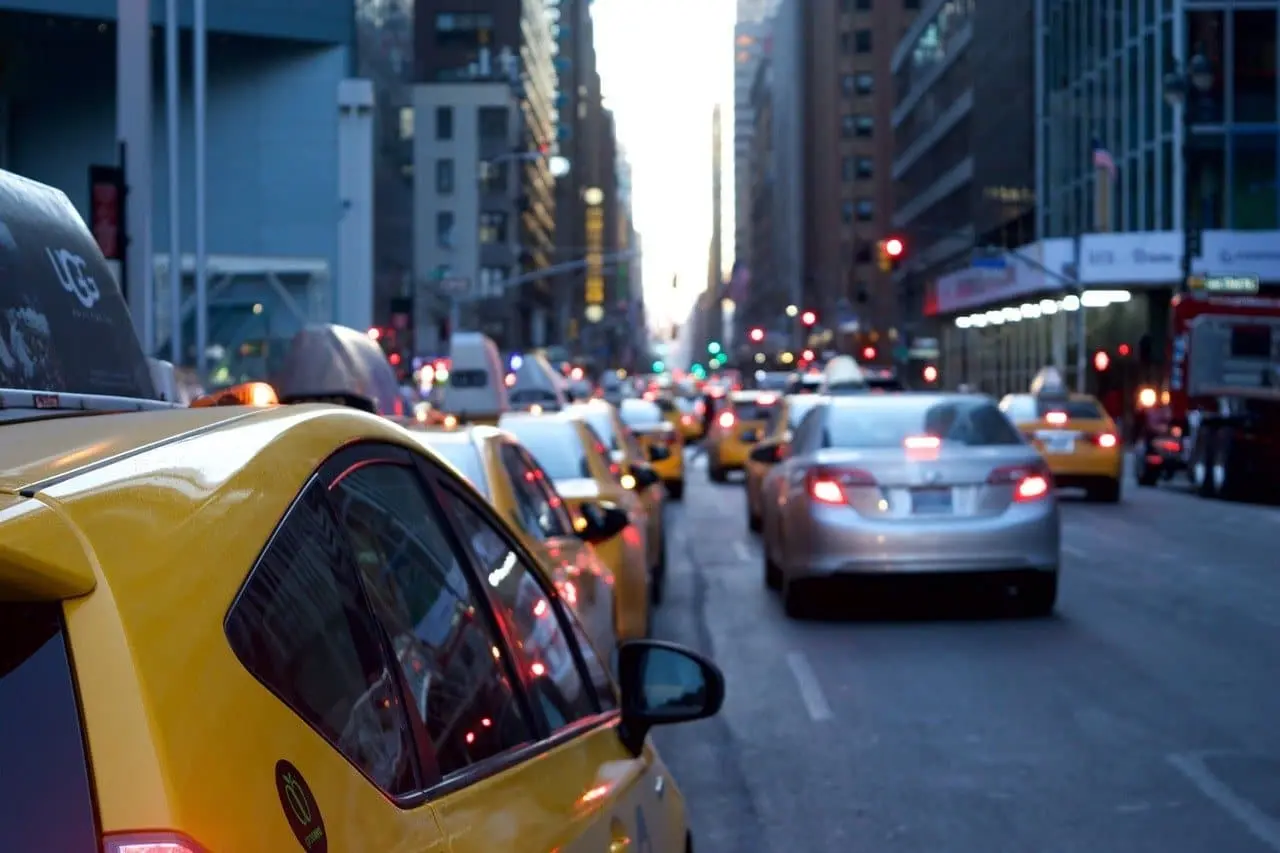 Taxis and cars in traffic