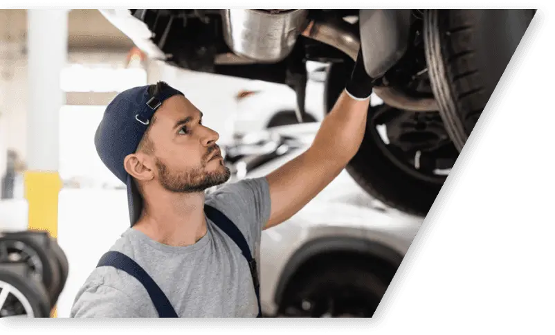 img - selective-focus-handsome-mechanic-cap-fixing-car
