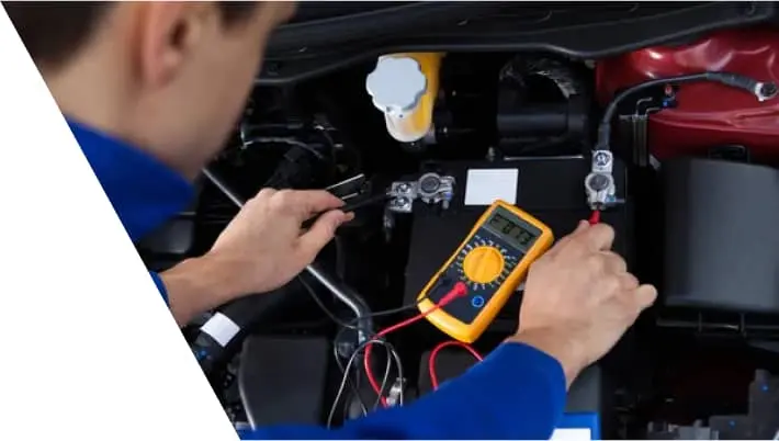 img - young-mechanic-adjusting-brake-caliper-screw-driver