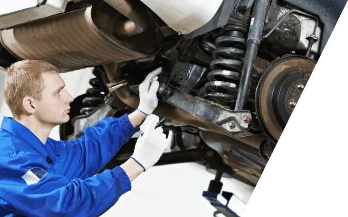 Sheridan auto mechanic repairing car suspension