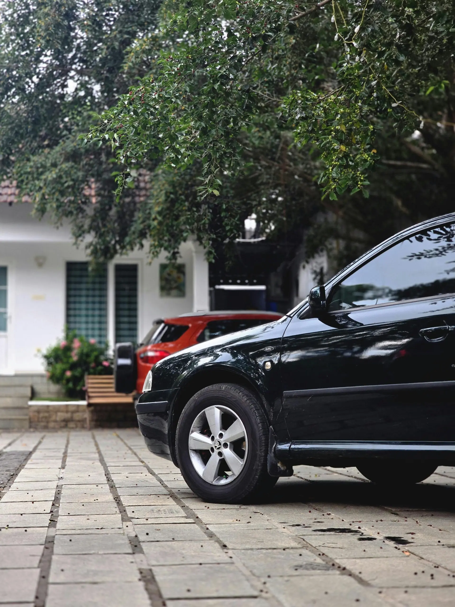 car leaving black soot on driveway