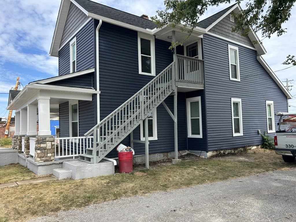 siding replacement blue big house