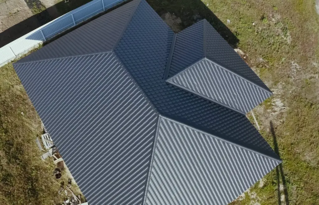 Modern roof made of metal. Corrugated metal roof and metal roofing.
