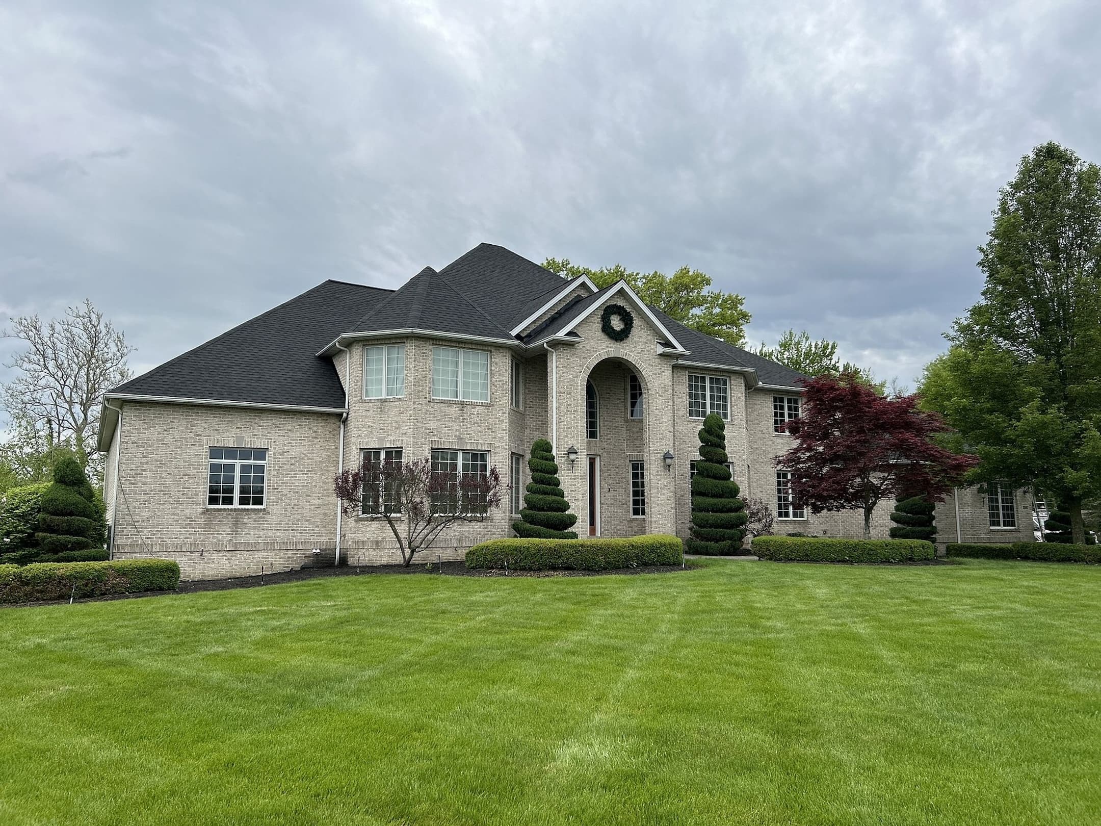 stone siding black asphalt roof ohio