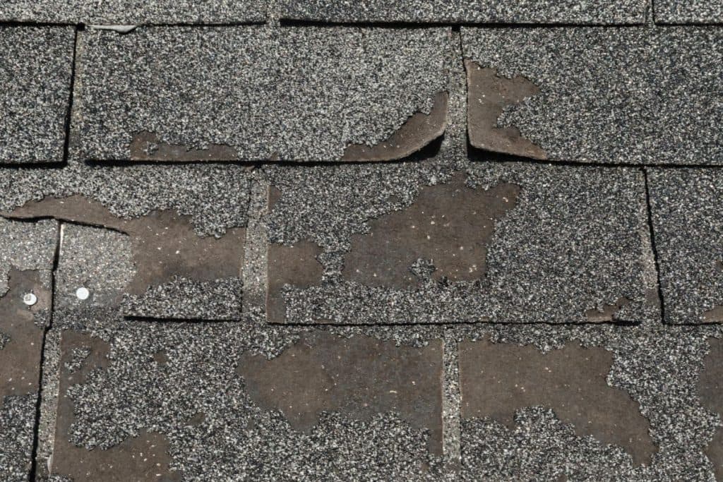 granule loss brown shingles roof