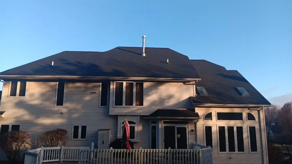 Newly installed black asphalt roof on residential home