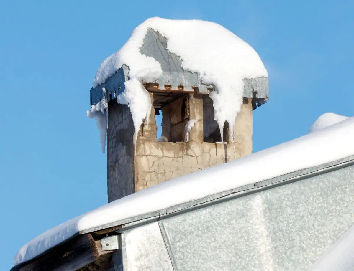 ice dam removal north royalton oh chimney covered in snow