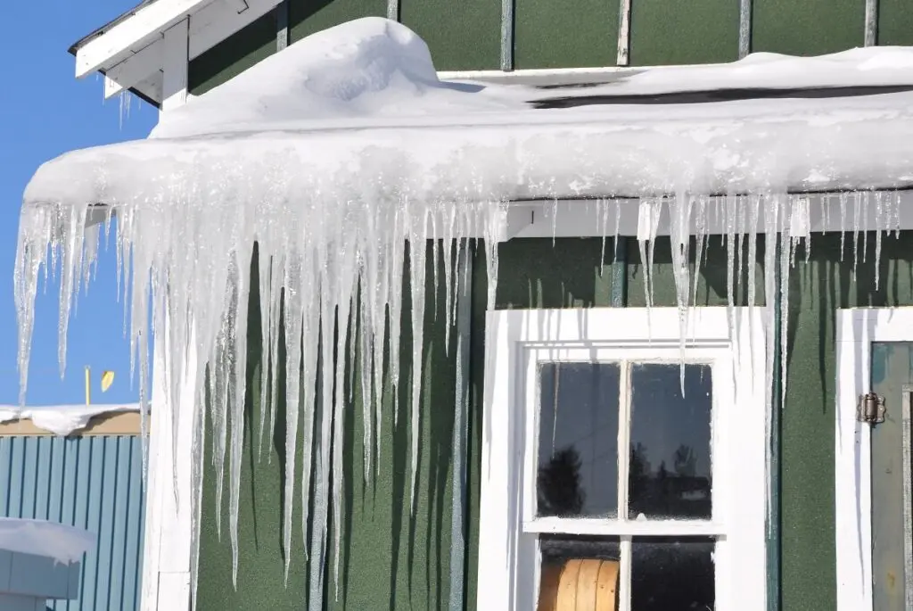 ice dam removal parma oh green house ice on gutter snow on top