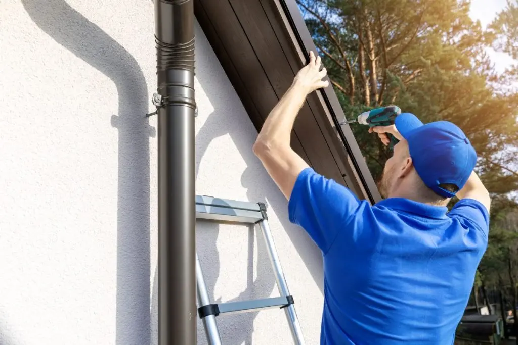 guy installing drip edge