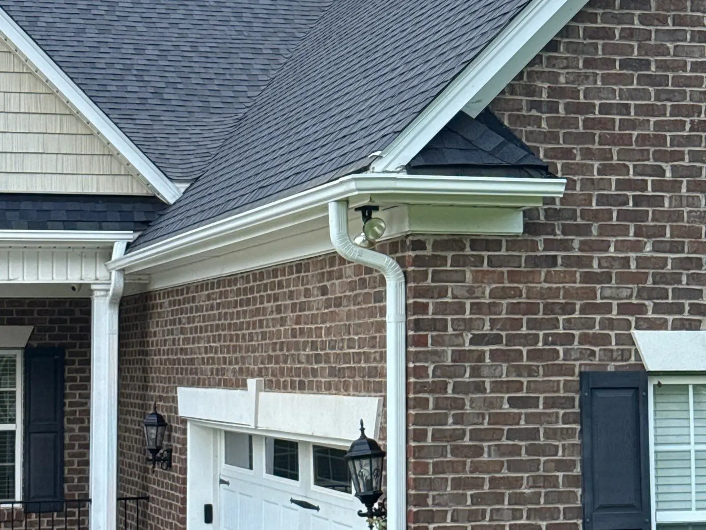 gutters durham nc brick wall dark shingles