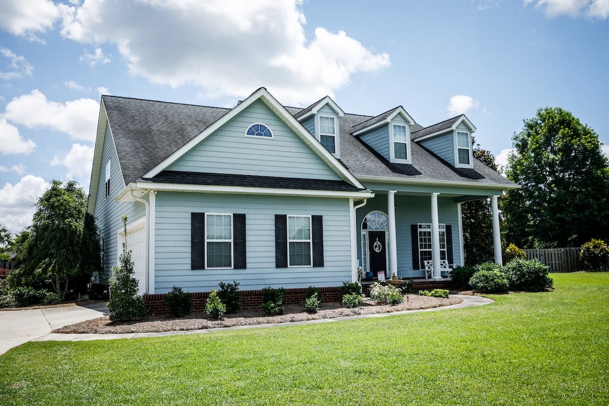 siding knightdale nc Blue Traditional Siding House Home in Suburbs Front Facing with Curb Appeal