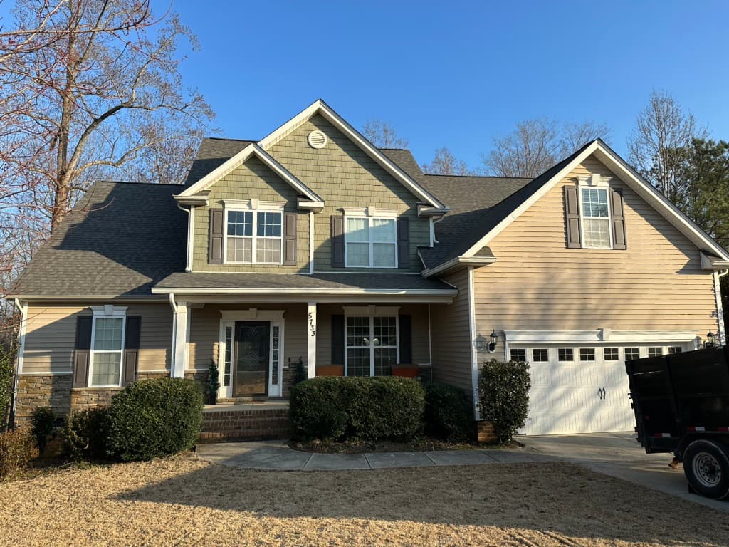 gutters raleigh nc big house light yellow siding