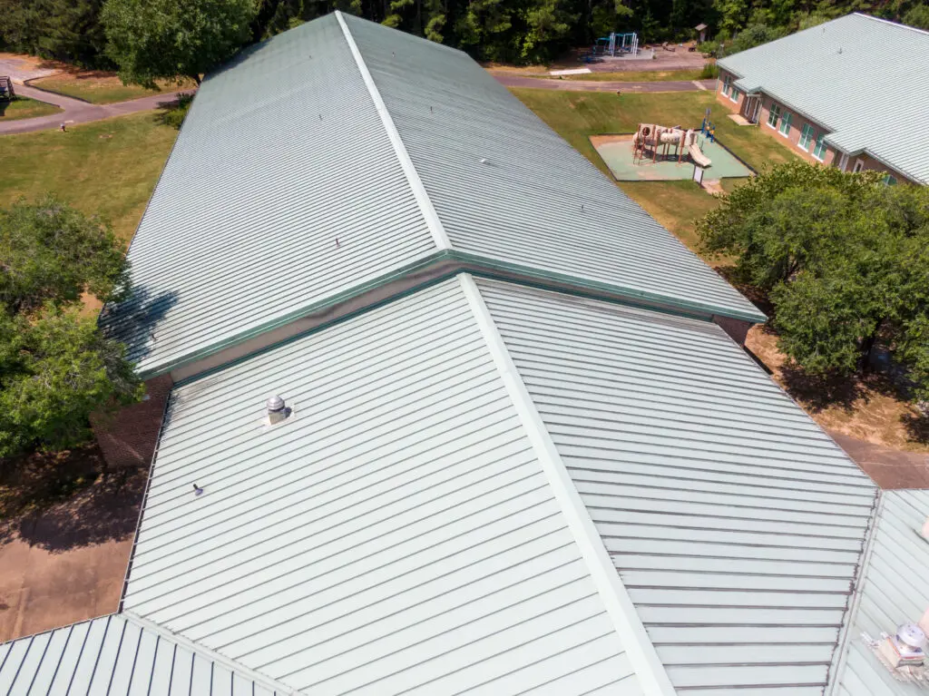 Daytime Drone Images of a Commercial Standing Seam Metal Roof on an Elementary School.