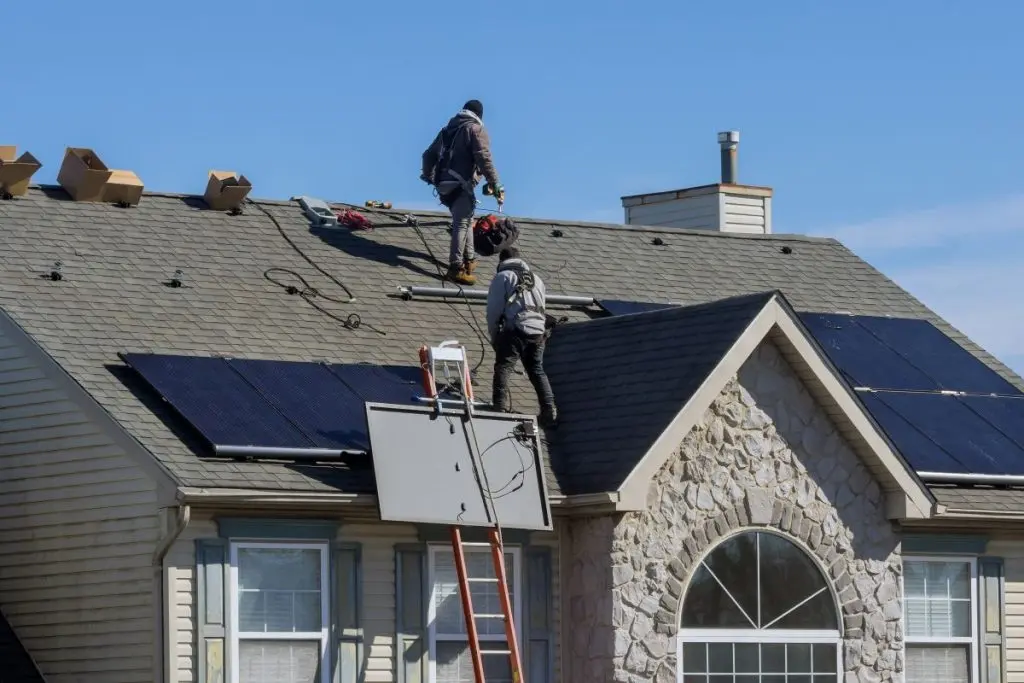 solar shingles vs solar panels guys installing solar panels