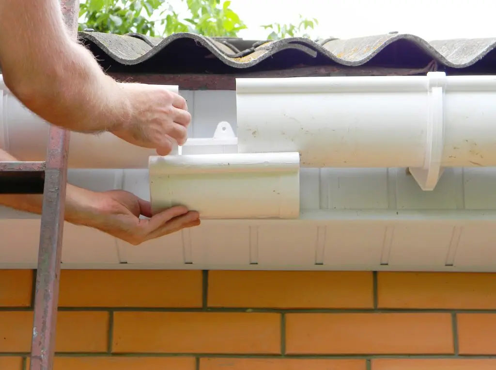 gutters holly springs nc Roof gutter pipe renovation, fix repair on brick house asbestoc roof