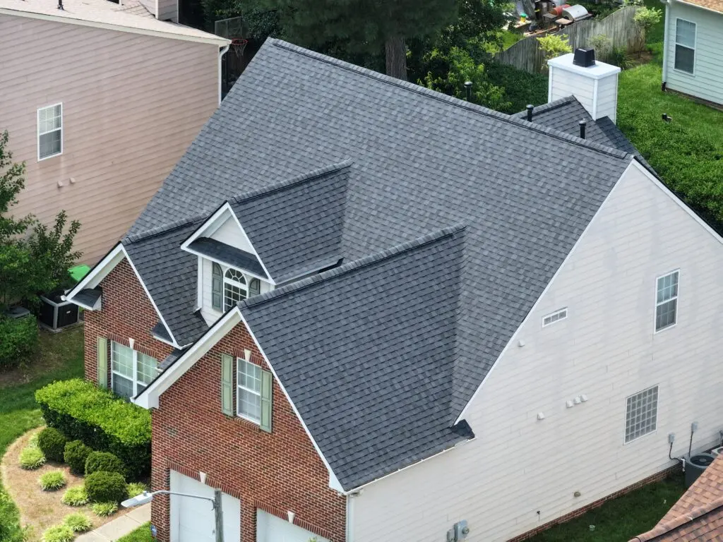 best roofing companies in wake forest nc grey shingles brick house wall