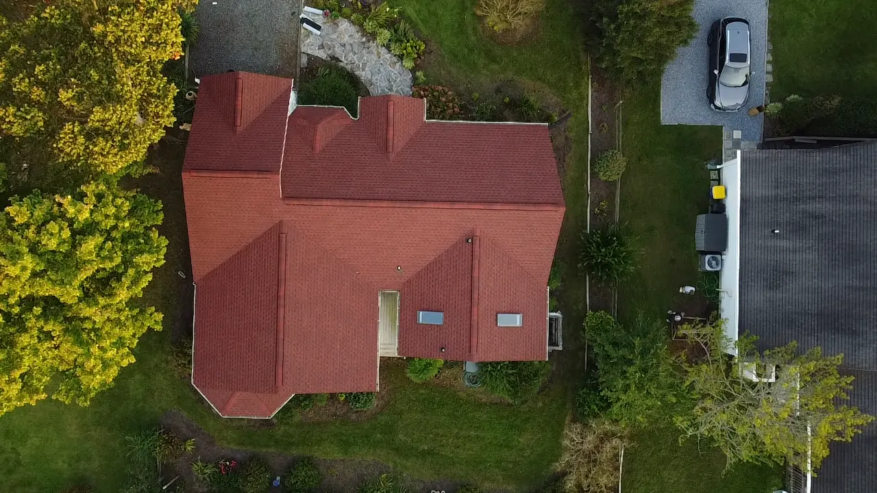 Red asphalt shingle roof