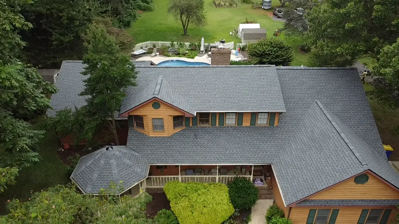 Aerial view of a light grey roof, roof maintenance