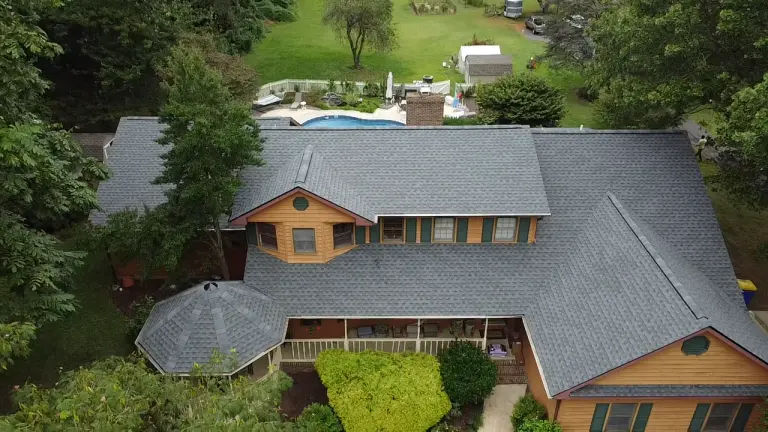 Aerial view of a light grey roof, roof maintenance