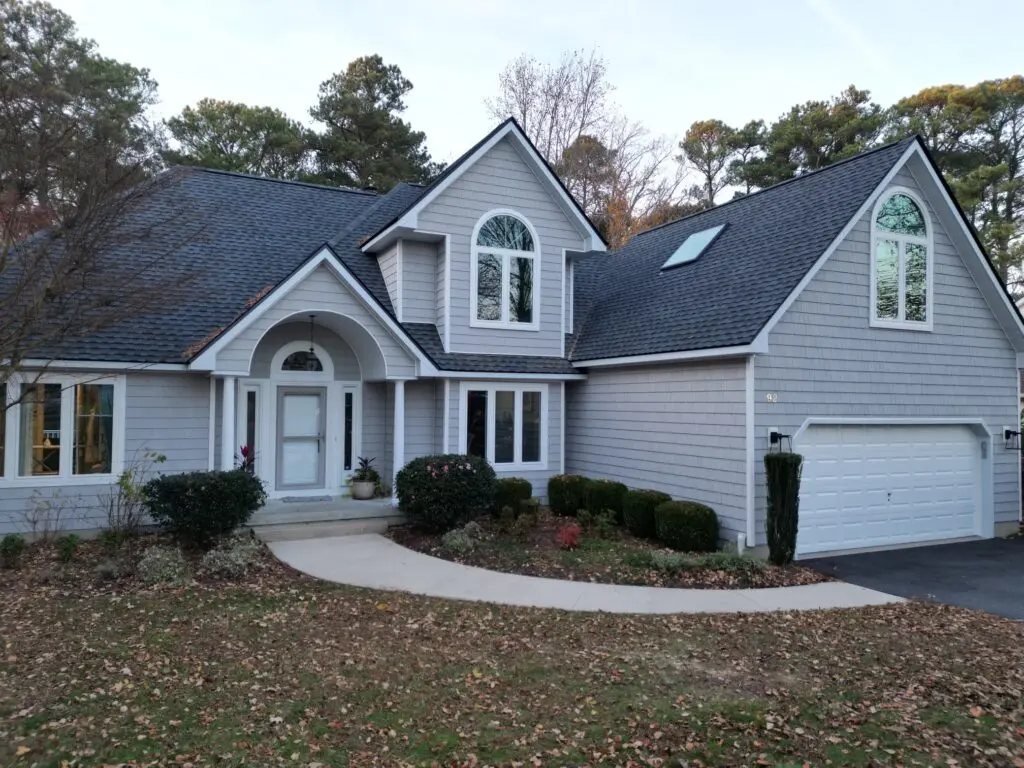 how long does a roof last big house light grey siding blue shingles