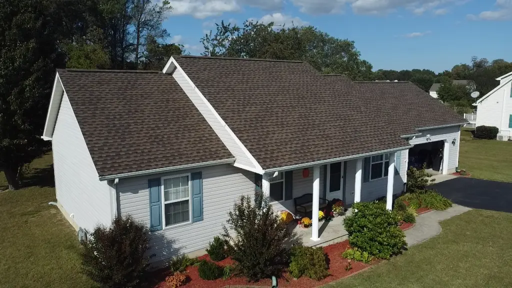 Dark grey shingle roof, roof maintenance