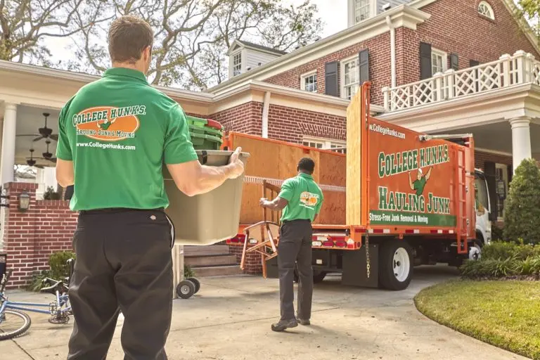 Two College HUNKS crews and trucks, illustrating the two-in-one model behind a junk franchise comparison