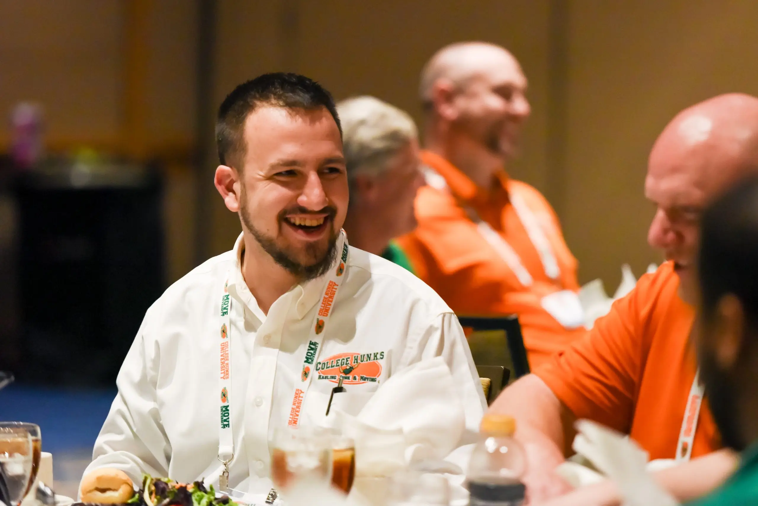A College HUNKS franchise owner at a system event, part of the network a franchise includes and a license does not