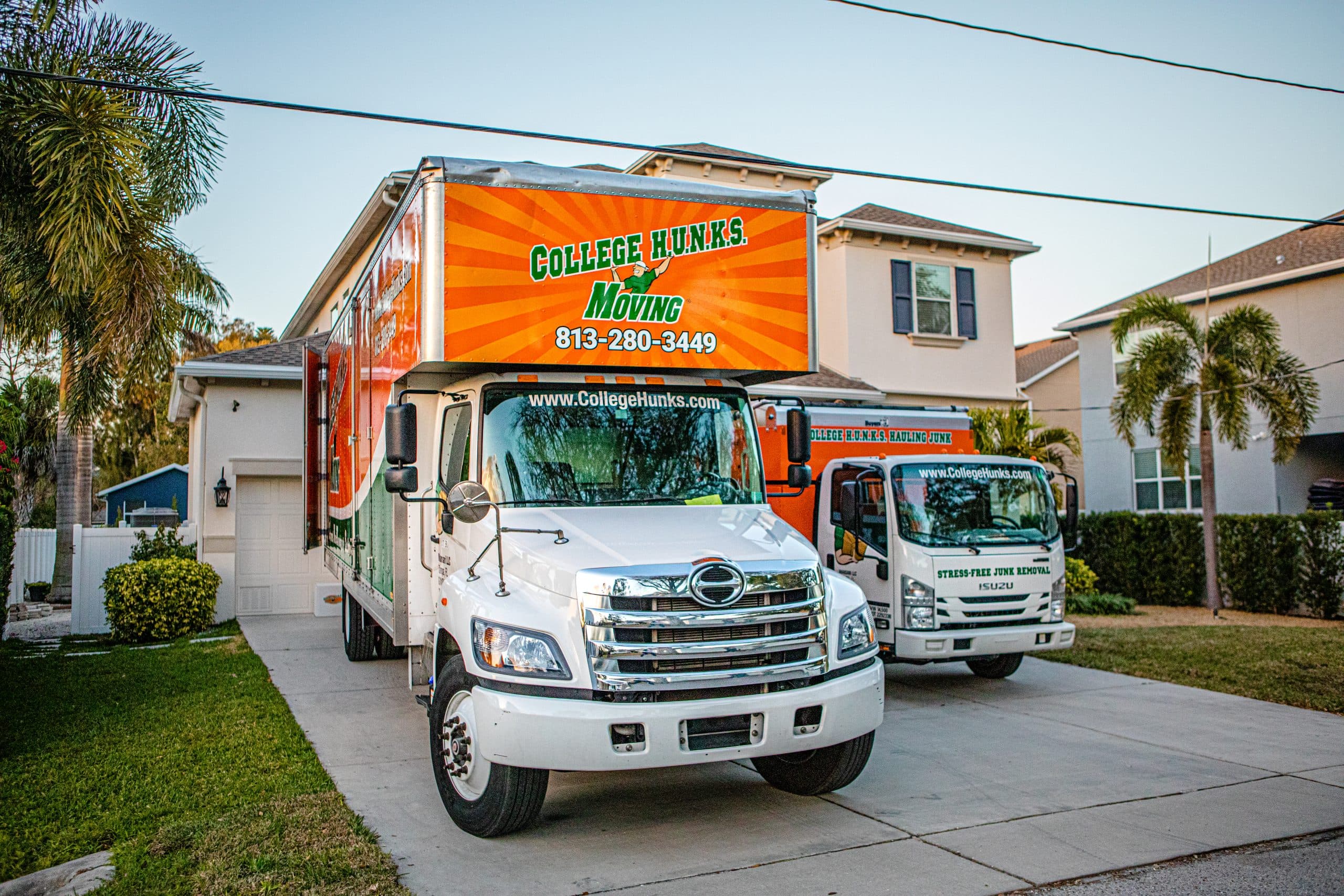 Branded College Hunks moving and junk removal trucks, the truck space a pricing sheet sells by