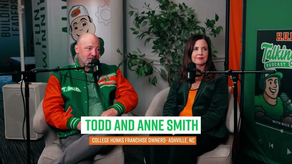 Todd and Anne Smith, College HUNKS Hauling Junk and Moving franchise owners in Asheville, North Carolina, seated with microphones during their Hunks Talking Junk podcast interview