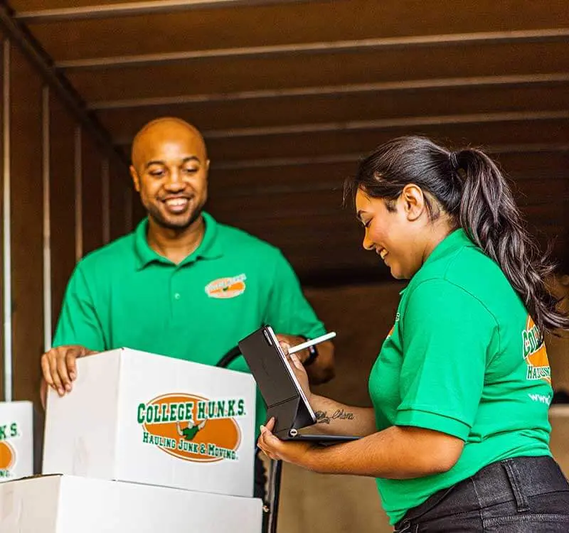 Franchise buyer reviewing a due diligence checklist while evaluating an existing location for resale