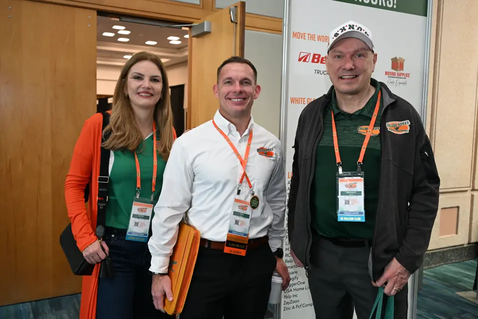 Three College HUNKS franchise owners smiling at the annual reunion conference