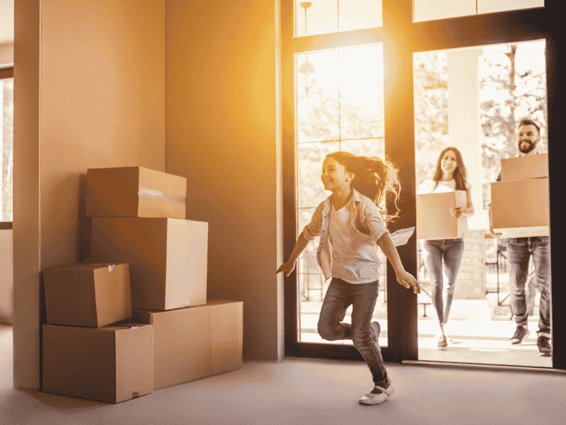 Family moving into their new home